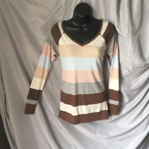 Creme, brown, light blue and pink, and grey fuzzy